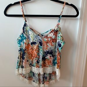 Multicolored top with fringe hem!